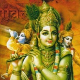 Shri Krishna, holding a flute and blowing a conch